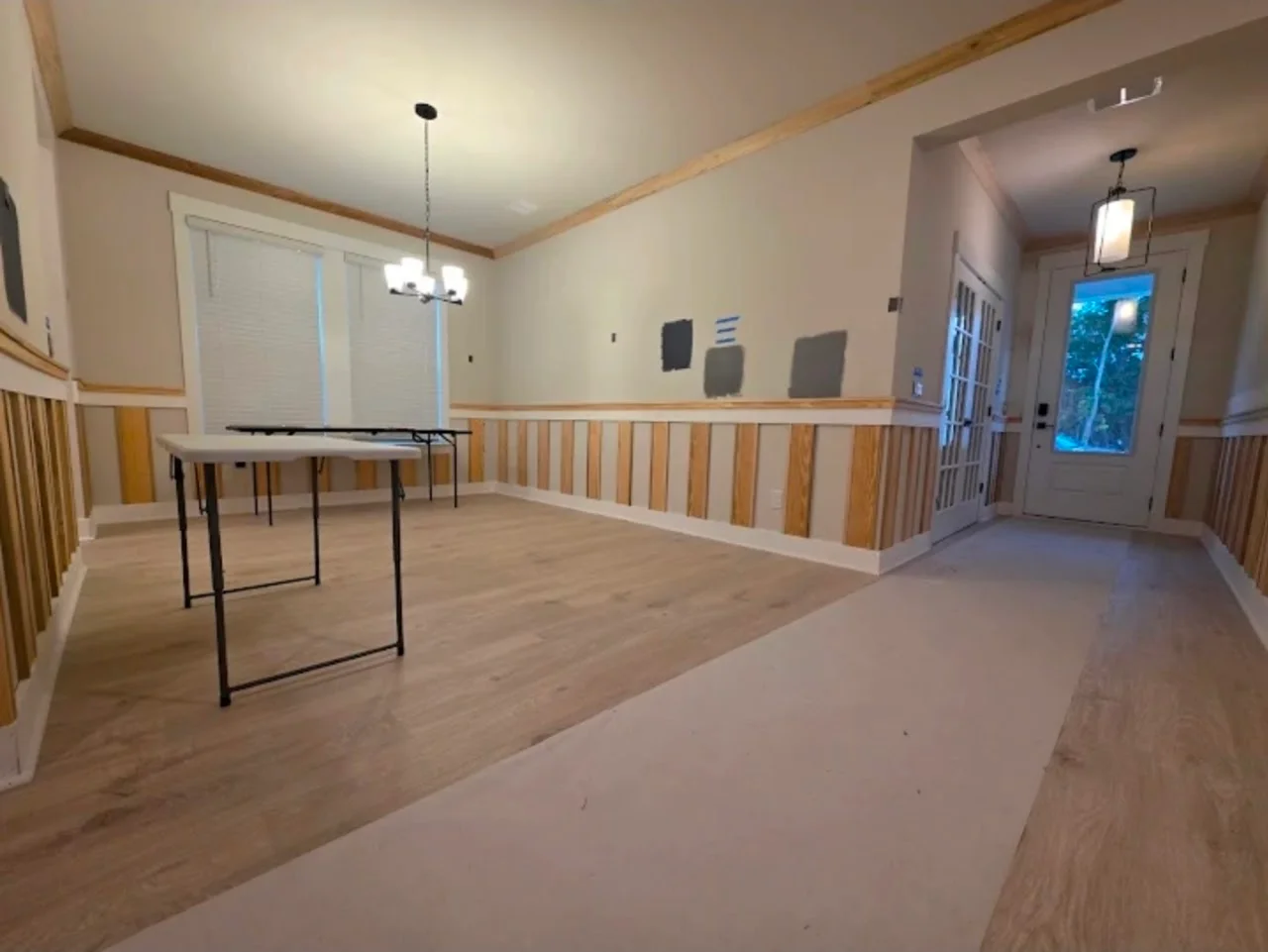 Wainscoting paired with exposed beam details