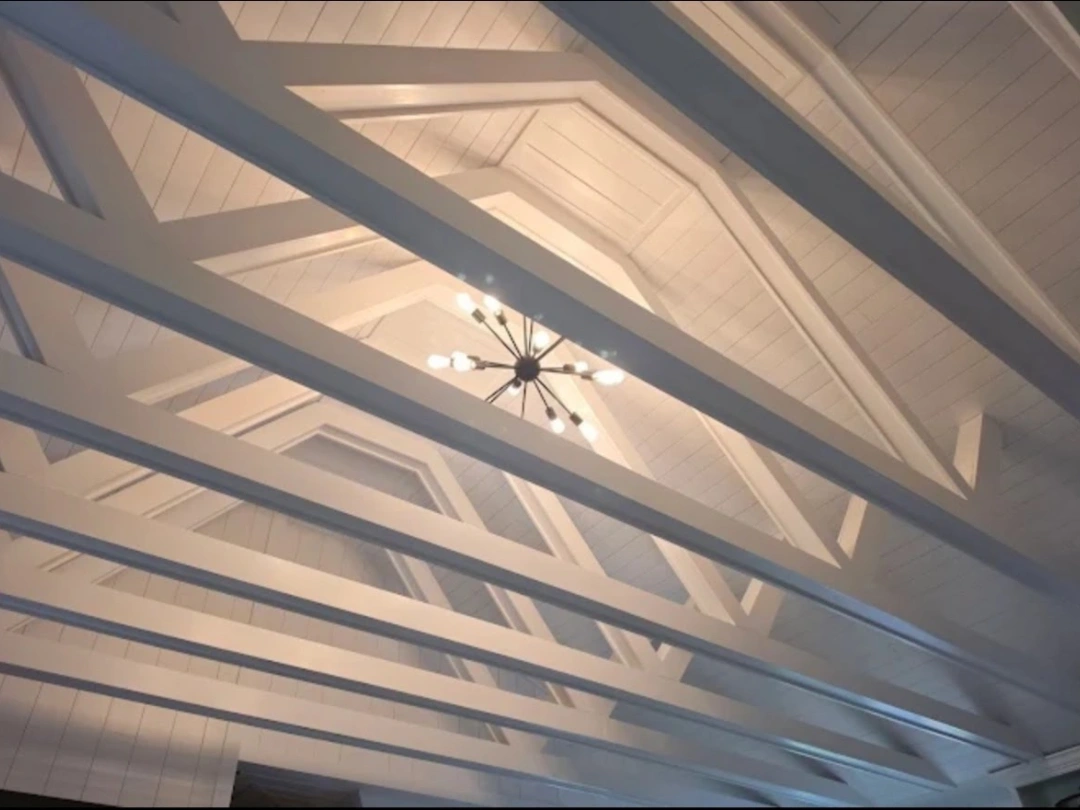 Architectural decorative beam ceiling with modern chandelier